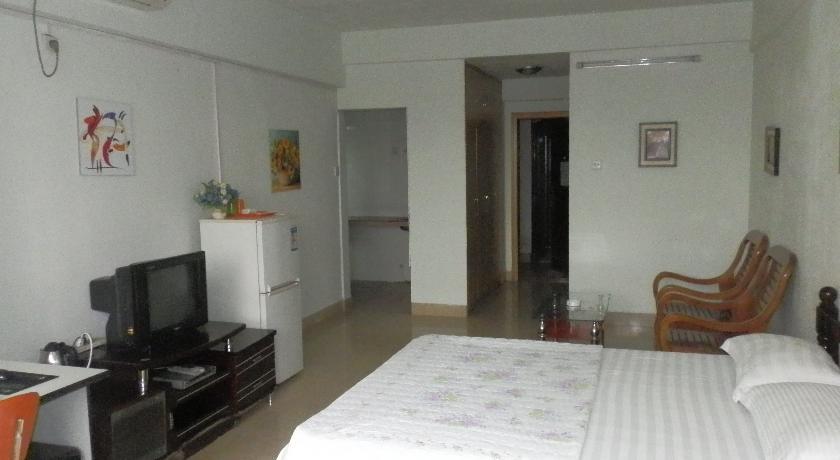 Апартаменты Xingfu Hotel Nanning