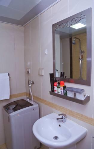 Апартаменты Dalian Mingrui Shiyuan Apartment
