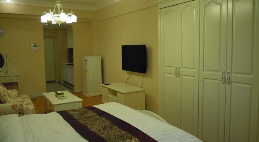 Апартаменты Dalian Mingrui Zuoan Classic Fashion Apartment