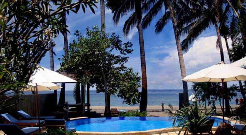 Отель Bali Bhuana Beach Cottages