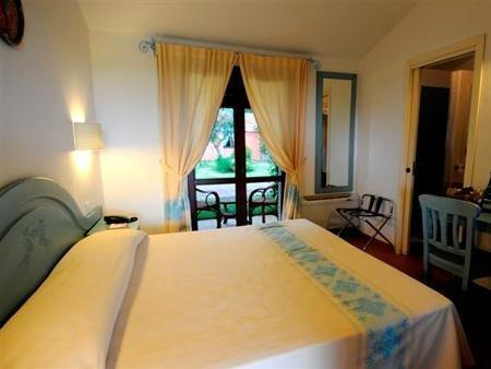 Отель Garden Beach Cala Sinzias