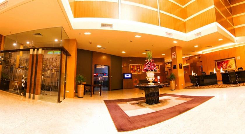 Отель New World Suites