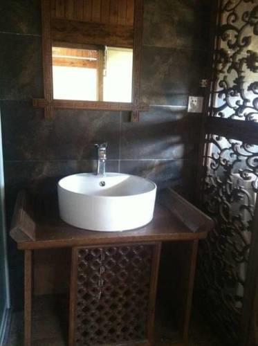 Отель Baisha Holiday Resort Lijiang