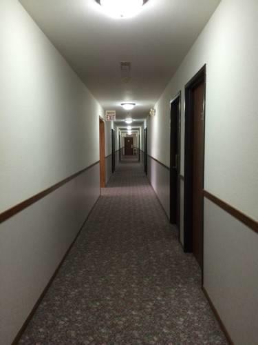 Отель Harlan Inn & Suites
