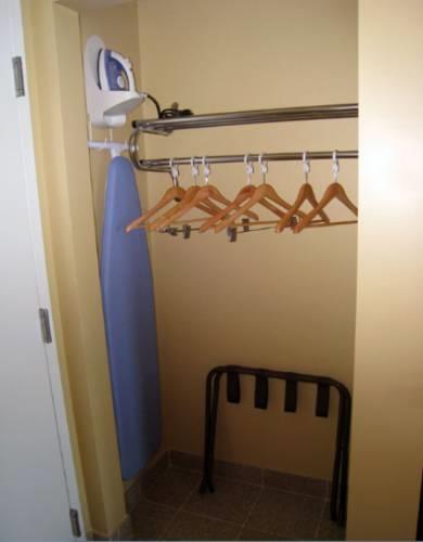 Отель The OC Studio Suites