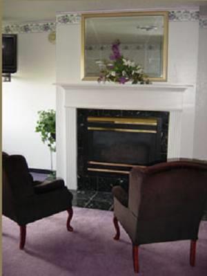 Отель Brass Bell Inn and Suites