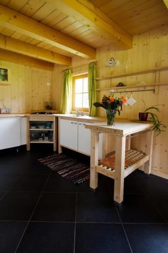Отель Alpi Giulie Chalets