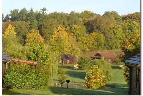 Отель Holiday Home Le Grand Bois Gimouille III