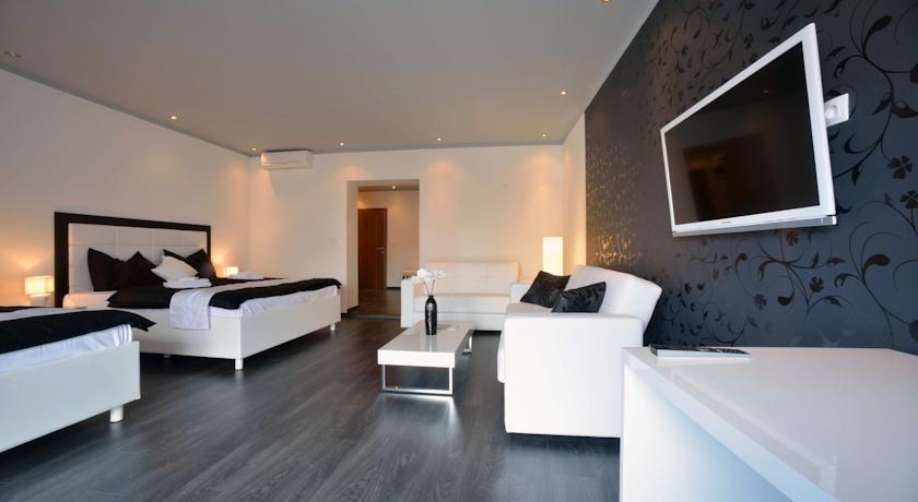 Апартаменты The Suites - Small Luxury Living