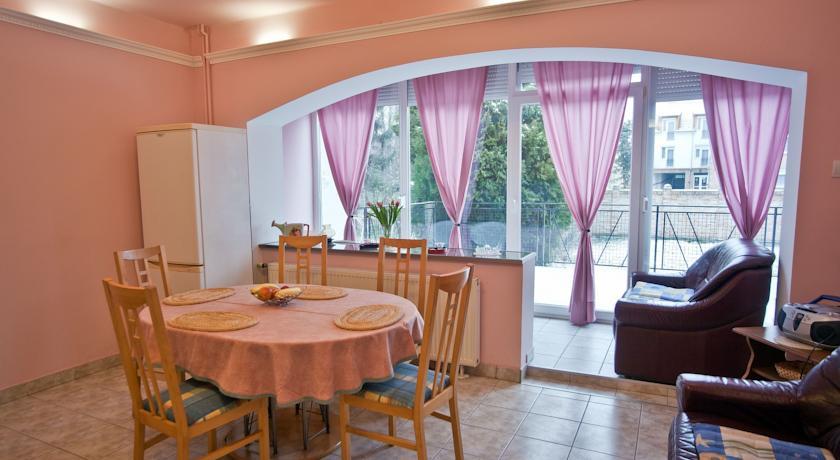 Апартаменты Napsugár Apartmanház