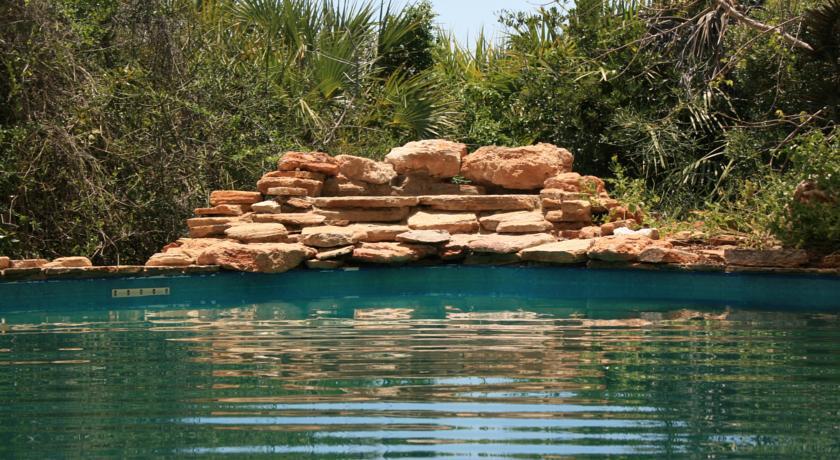 Отель Sanctuary Saadani Safari Lodge