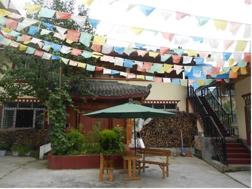 Отель Jiuzhaigou Xiang Ba La Hostel