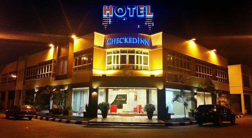 Отель Hotel CheckedInn