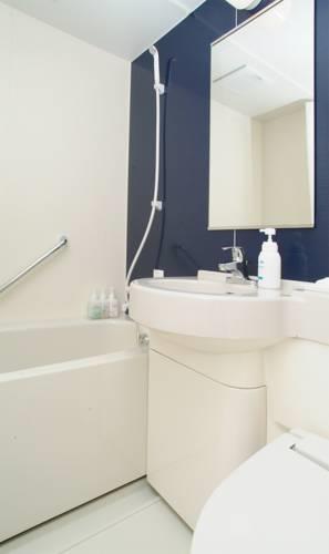 Отель Quad Inn Yokote
