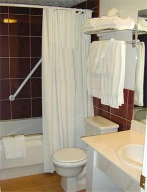 Отель Gateway Inn and Suites