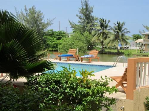 Отель Ambergris Lake Villas