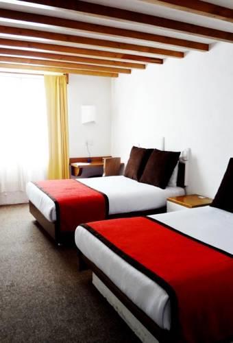 Отель Hotel Hacienda El Campanario