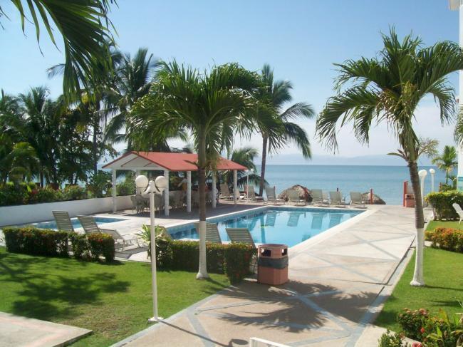 Отель Hotel y Suites Corita