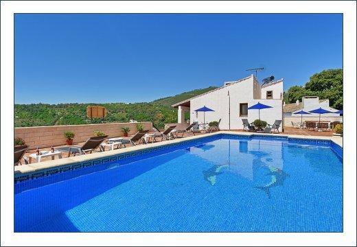 Отель Casas Rurales Juzcar Centro