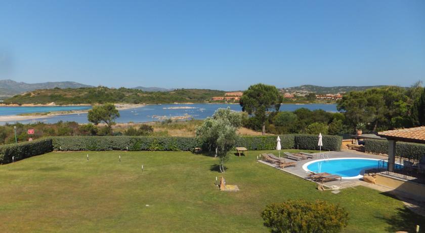 Вилла Porto Coda Cavallo Villas
