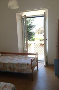 Апартаменты Apartment Anzio delle Robinie