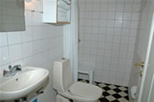 Апартаменты Strandslottet Apartments