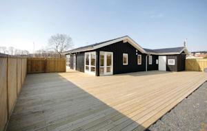 Отель Holiday home Kausvej Bjert II