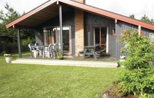 Отель Holiday home As Strandby Juelsminde IX