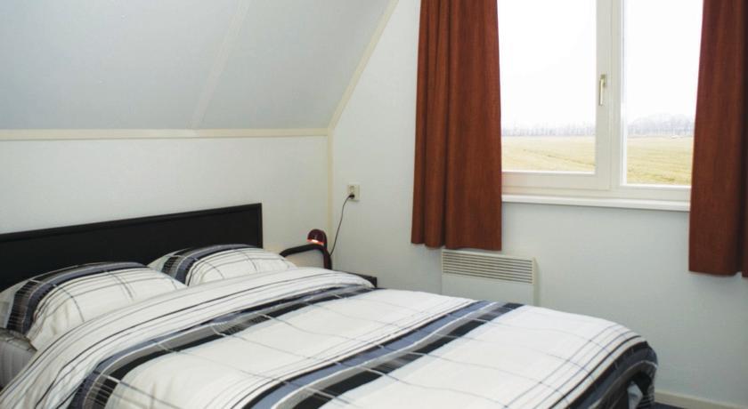 Апартаменты Holiday home Den Oever X