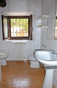 Отель Holiday home Loc.Poggi Scassi