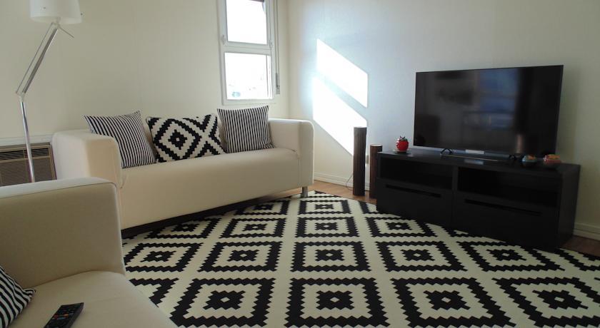 Апартаменты Estoril Sunset Apartment