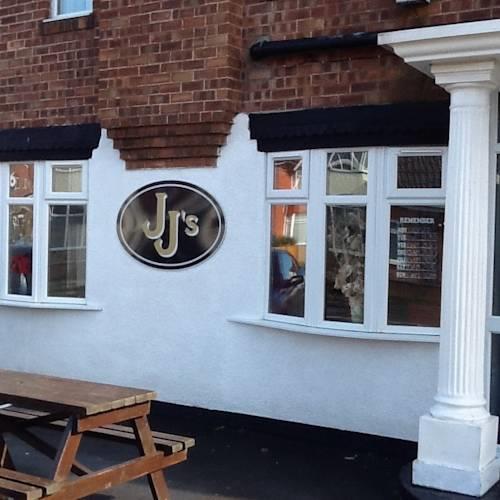 Отель JJs Hotel, Bar, and Restaurant