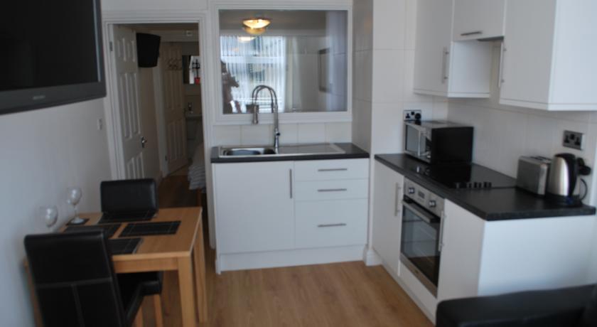 Апартаменты The Langland Bay Apartment