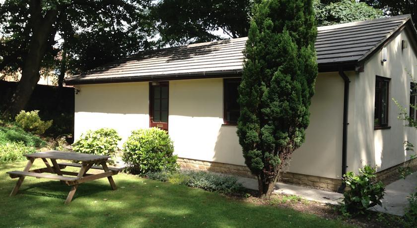 Отель Woodlands Boutique Cottage