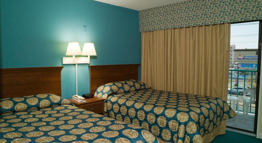 Отель Cayman Suites Hotel