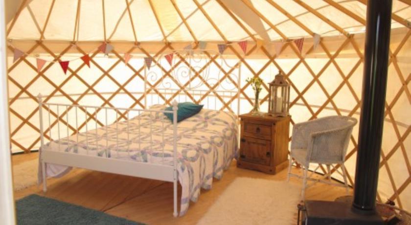 Отель The Coachhouse Yurts
