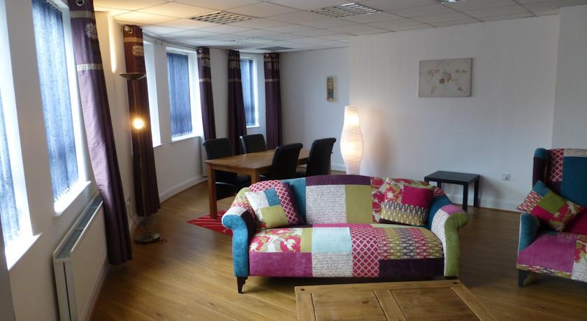 Апартаменты Strand House Suites