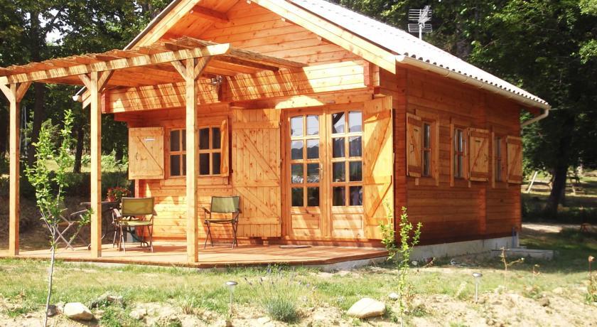 Отель Chalets du Bois de Vache