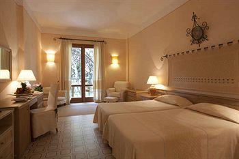 Отель Fortevillage Resort - Hotel Castello
