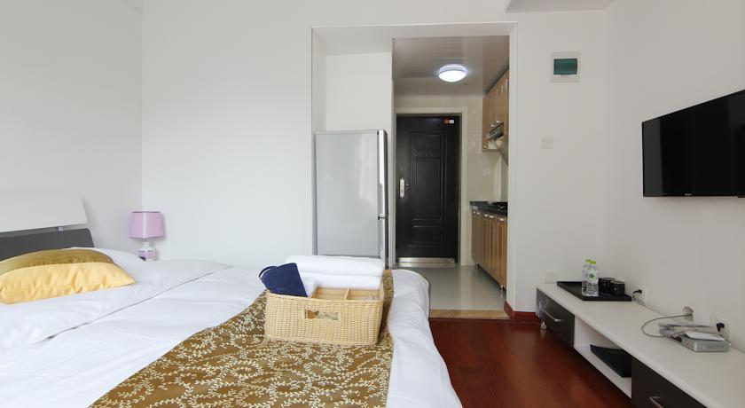 Апартаменты Tujia Sweetome Vacation Apartments (Yantai Yindu New City Plaza)