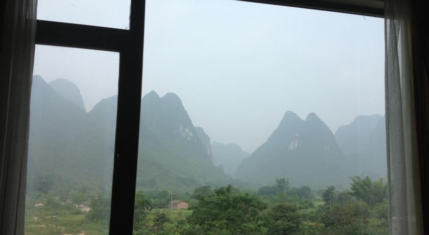 Отель Yangshuo Ecofarm Lodge