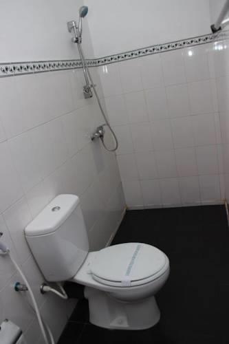 Отель Airport Village Home Stay