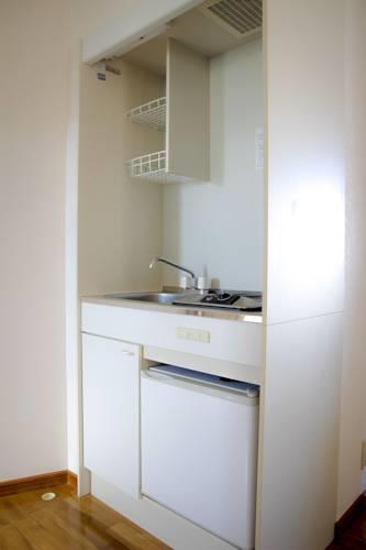 Отель Oozi Cafe & Condo Hotel