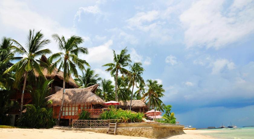 Отель The Coral Blue Oriental Beach Villas and Suites
