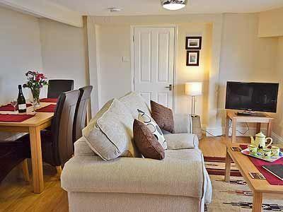 Отель Sennen Apartment 1