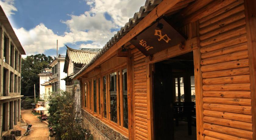 Отель Dali Shuanglang Mingtang Inn