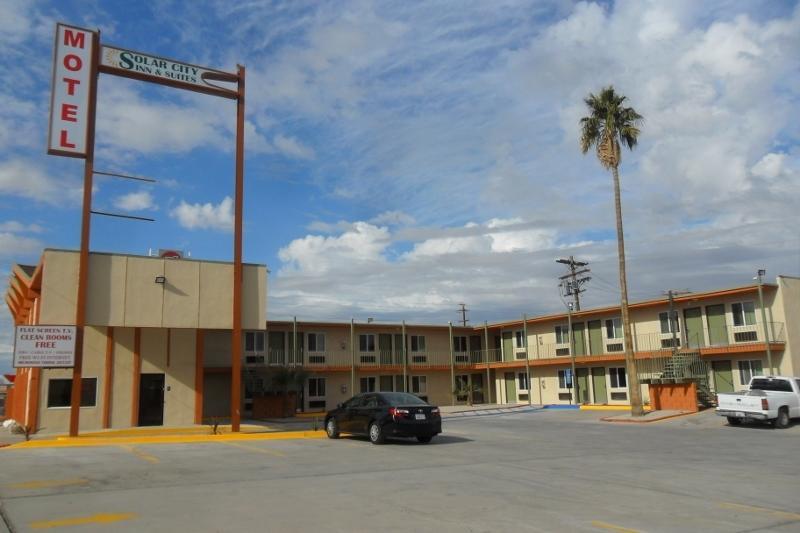 Отель Solar City Inn & Suites