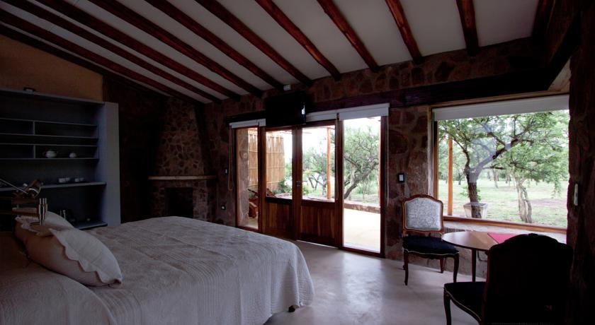 Отель Calma Nono Natural Suites