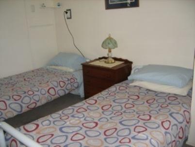 Хостел On the Beach Backpackers Lodge