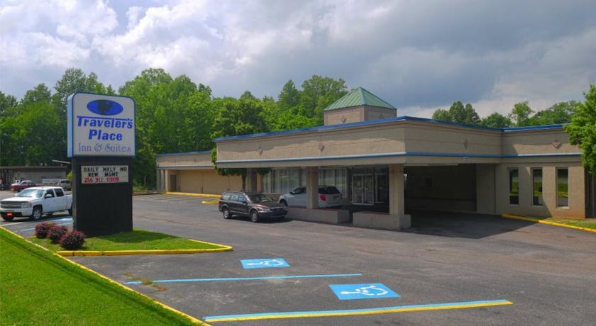 Отель Travelers Place Inn & Suites